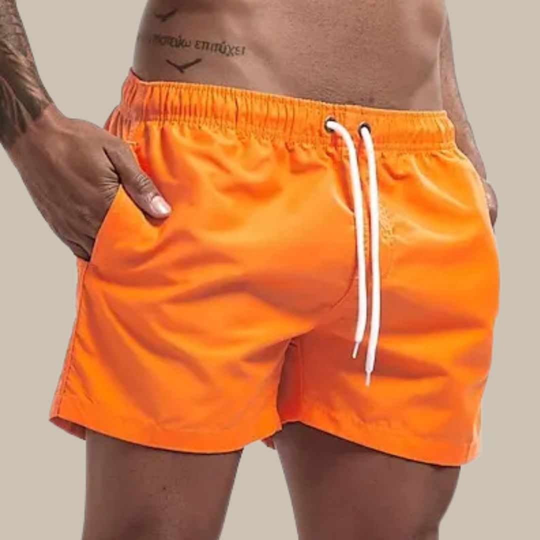 Herrbadshorts med praktiska fickor och snabbtorkande material