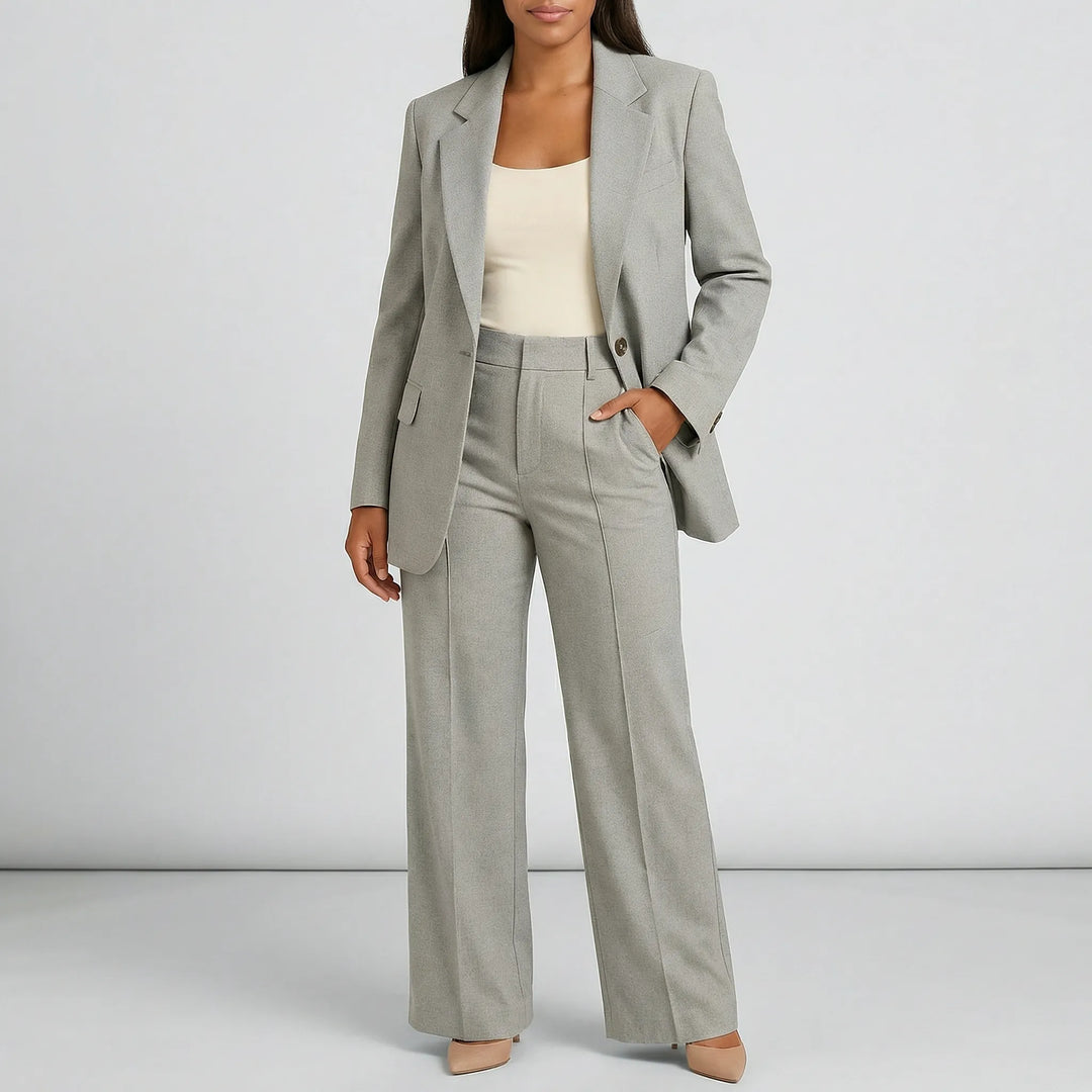 Exklusiv damkostym med vida byxor och figursydd blazer