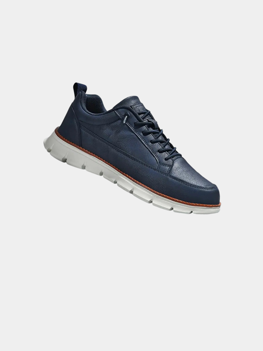 Blå stödjande sneakers i läder med vit sula