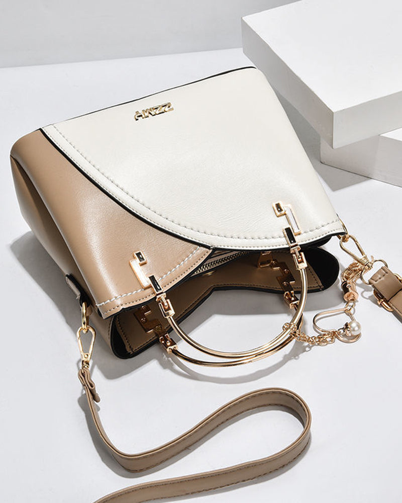 Crossbody väska för dam med justerbar och avtagbar axelrem