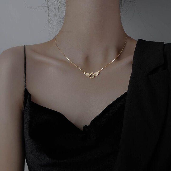 "Ängelvinge halsband för kvinnor, silver och guld, med flytande diamant, elegant änglavingeform, justerbart 45-50 cm"