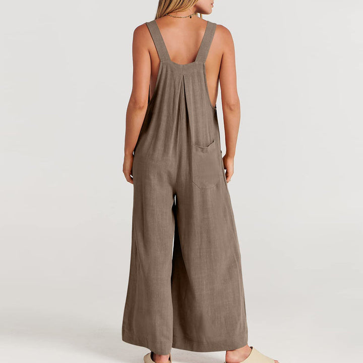Ärmlös blommig jumpsuit för kvinnor, vida ben, justerbara axelband, trendig och elegant, bekväm