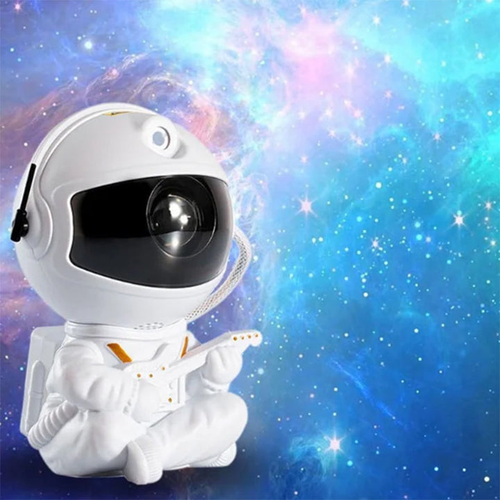 "Astronautprojektor för stjärnhimmel i rum, skapar en stjärnklar himmel, lugnande nattljus för avkoppling."