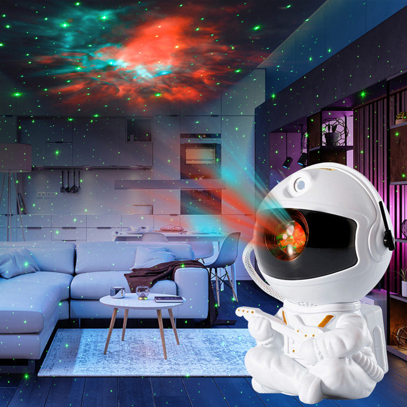 "Astronautprojektor för stjärnhimmel i rum, skapar en stjärnklar himmel, lugnande nattljus för avkoppling."