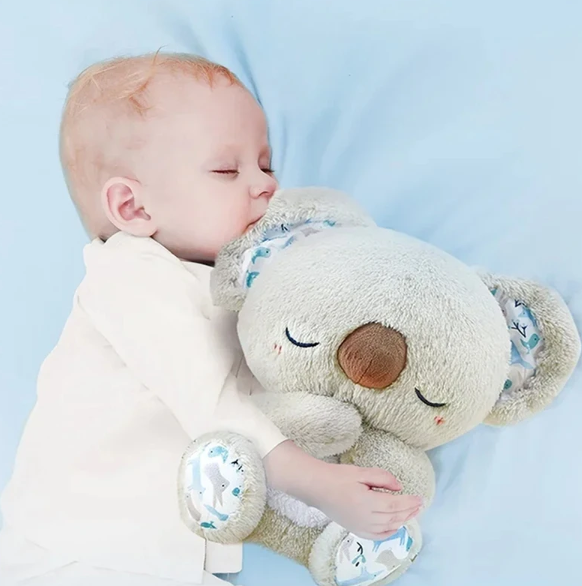 Plyschdjur koala som fungerar som insomningshjälp och skapar trygghet för barn