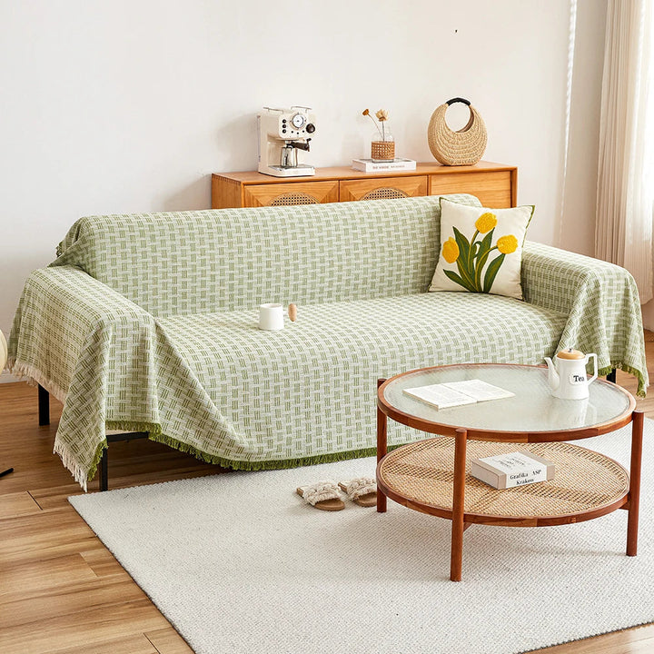 Möbelskydd för soffa med quiltad design och praktisk passform hemma