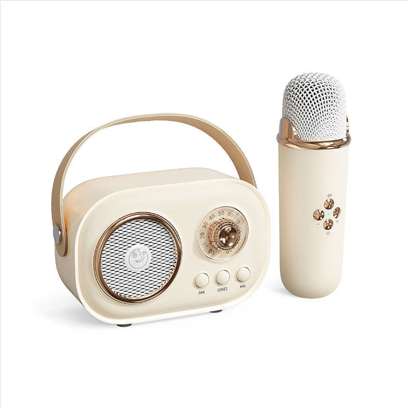 Bärbar Bluetooth-högtalare för barn med trådlös mikrofon, kompakt design, perfekt för karaoke och musikupplevelser.
