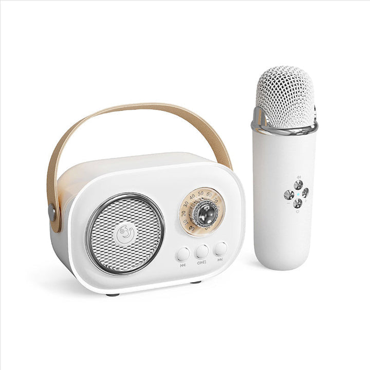 Bärbar Bluetooth-högtalare för barn med trådlös mikrofon, kompakt design, perfekt för karaoke och musikupplevelser.