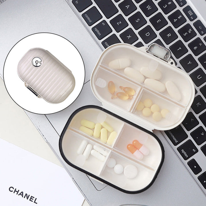Bärbar daglig pillerlåda med 7 delar; kompakt, vit design i PET+silikon för organiserad medicinhantering.