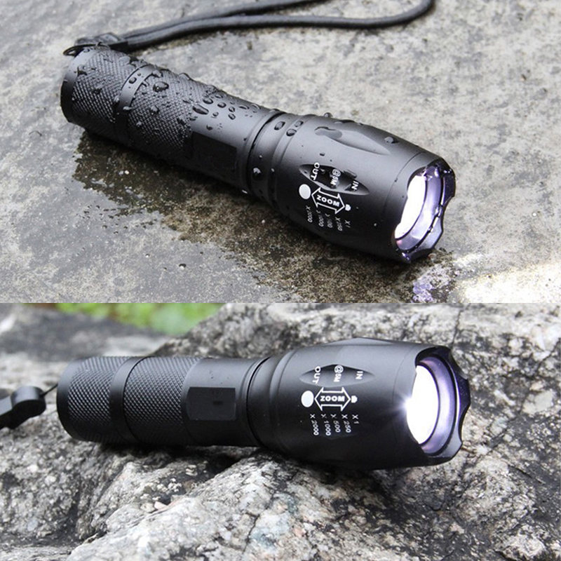 "Bärbar laddbar aluminiumficklampa med LED-zoom, robust design, vattentät, lämplig för camping och utomhusaktiviteter."
