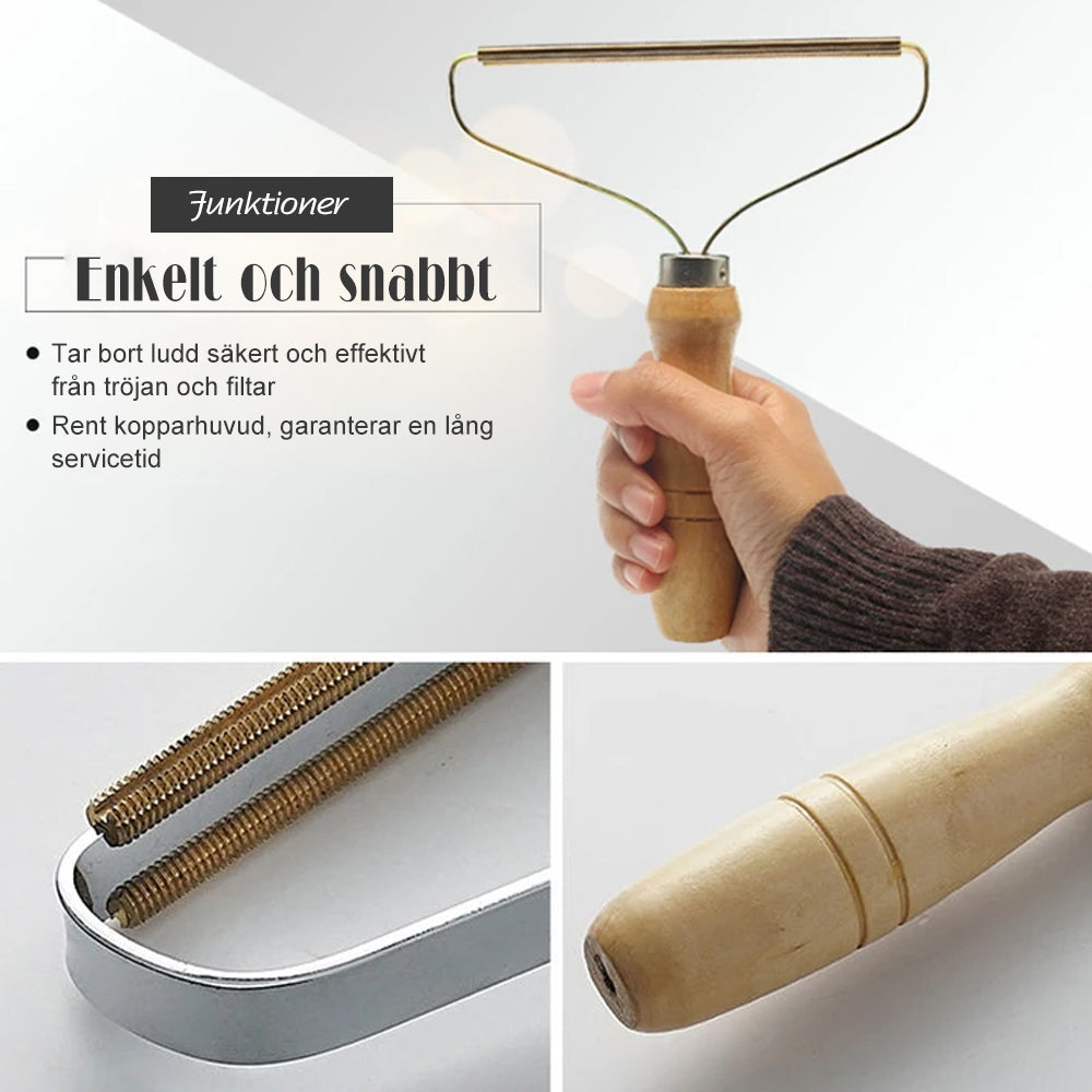 Bärbar luddborttagare för kläder och tyger, elegant och kompakt, avlägsnar ludd effektivt och batterifritt.