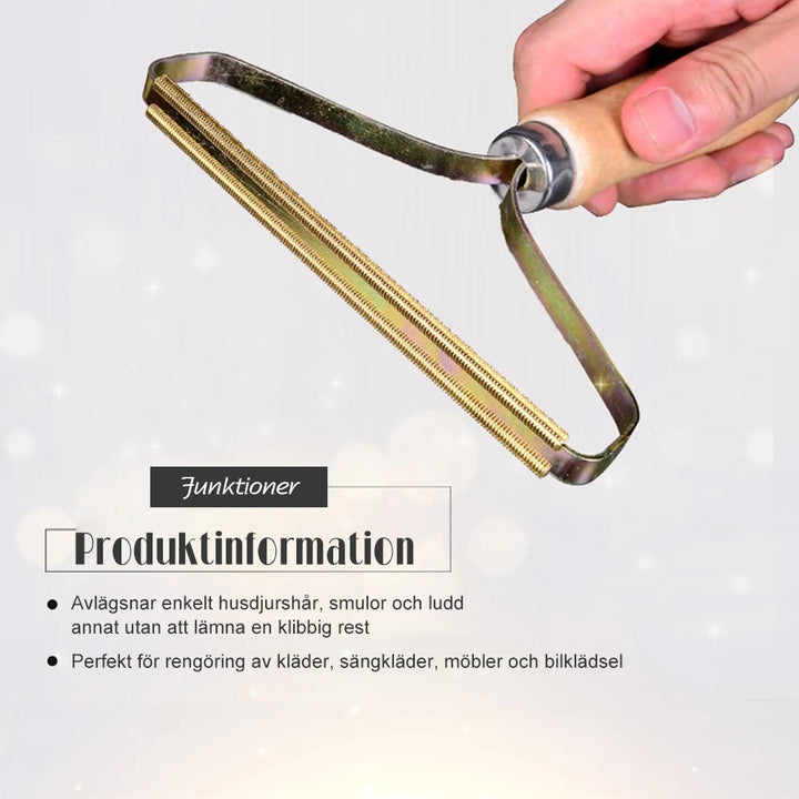 Bärbar luddborttagare för kläder och tyger, elegant och kompakt, avlägsnar ludd effektivt och batterifritt.