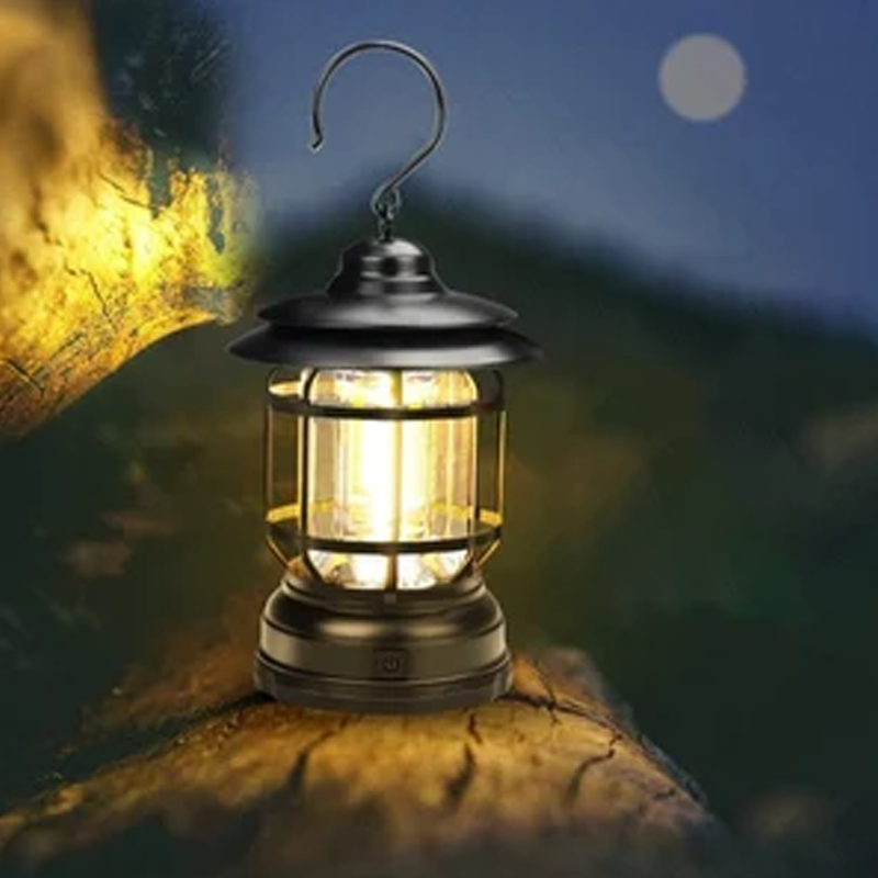 "Bärbar retro LED campinglampa, röd färg, med mjuk 360° belysning i stilren retro design för utomhusbruk."