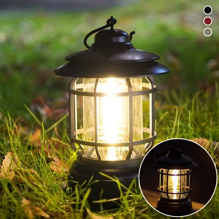 "Bärbar retro LED campinglampa, röd färg, med mjuk 360° belysning i stilren retro design för utomhusbruk."