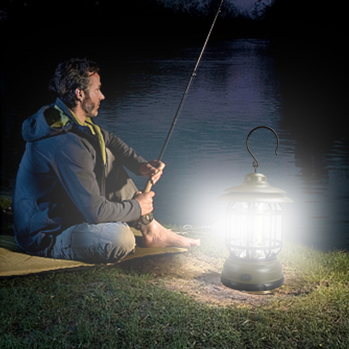 "Bärbar retro LED campinglampa, röd färg, med mjuk 360° belysning i stilren retro design för utomhusbruk."