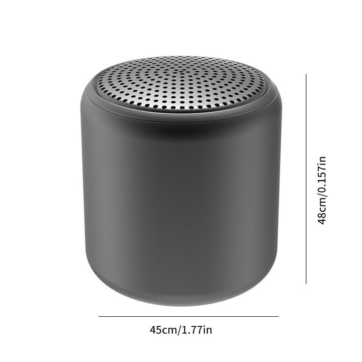"Bärbar trådlös Bluetooth-högtalare i macaroon-färg med modern design, kompakt och lätt, perfekt för resor och hemmet."