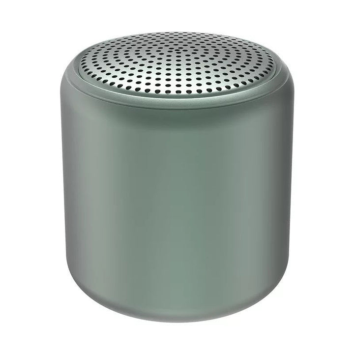 "Bärbar trådlös Bluetooth-högtalare i macaroon-färg med modern design, kompakt och lätt, perfekt för resor och hemmet."