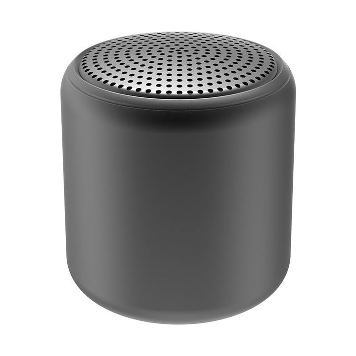"Bärbar trådlös Bluetooth-högtalare i macaroon-färg med modern design, kompakt och lätt, perfekt för resor och hemmet."