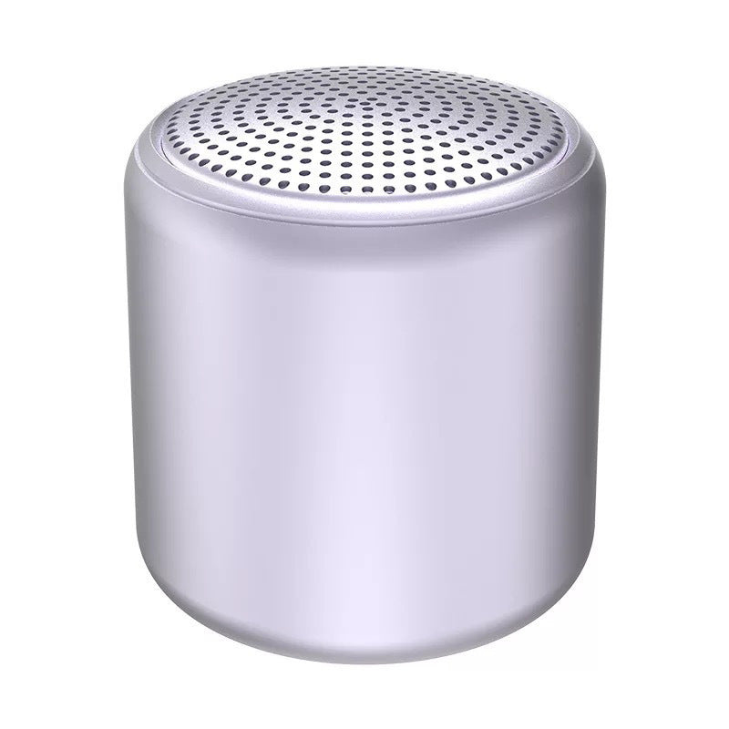 "Bärbar trådlös Bluetooth-högtalare i macaroon-färg med modern design, kompakt och lätt, perfekt för resor och hemmet."