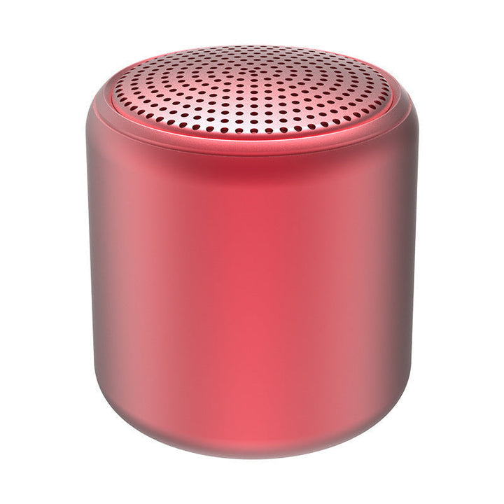 "Bärbar trådlös Bluetooth-högtalare i macaroon-färg med modern design, kompakt och lätt, perfekt för resor och hemmet."