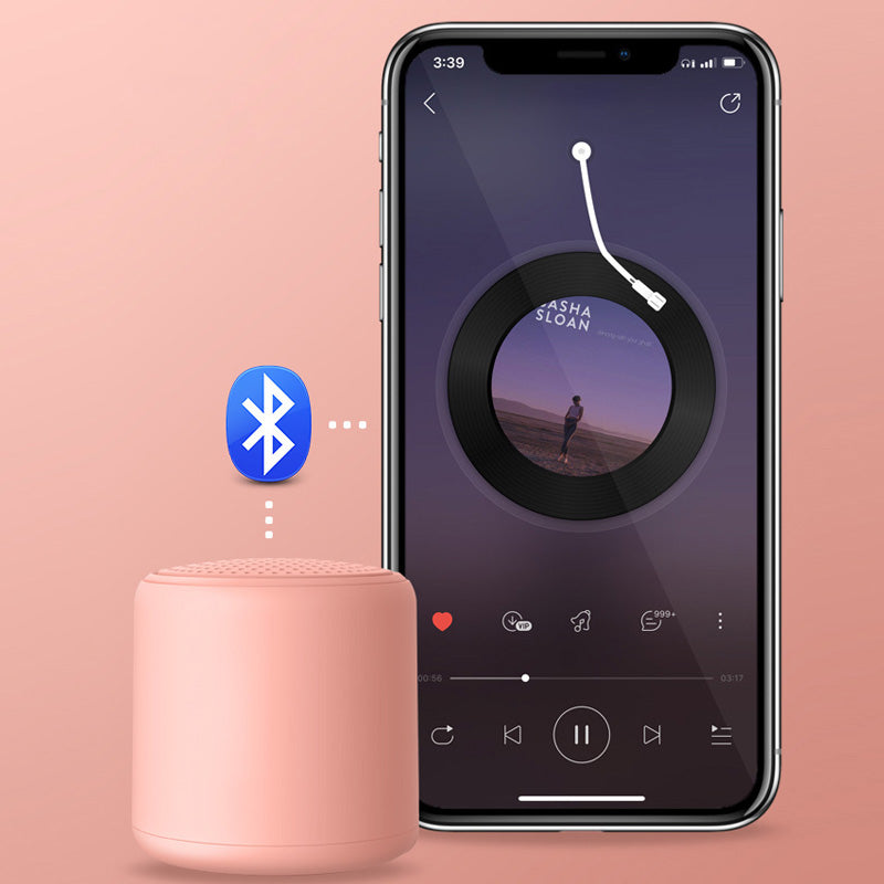 "Bärbar trådlös Bluetooth-högtalare i macaroon-färg med modern design, kompakt och lätt, perfekt för resor och hemmet."