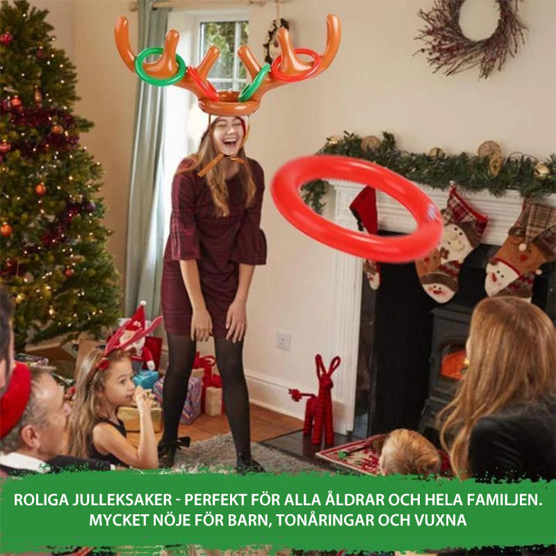 Barn uppblåsbart ringkastningsspel med färgglada renhorn och kastringar för festlig jullek, perfekt för familjer.