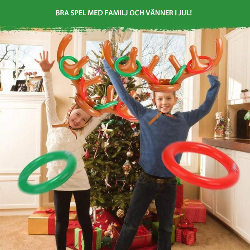 Barn uppblåsbart ringkastningsspel med färgglada renhorn och kastringar för festlig jullek, perfekt för familjer.