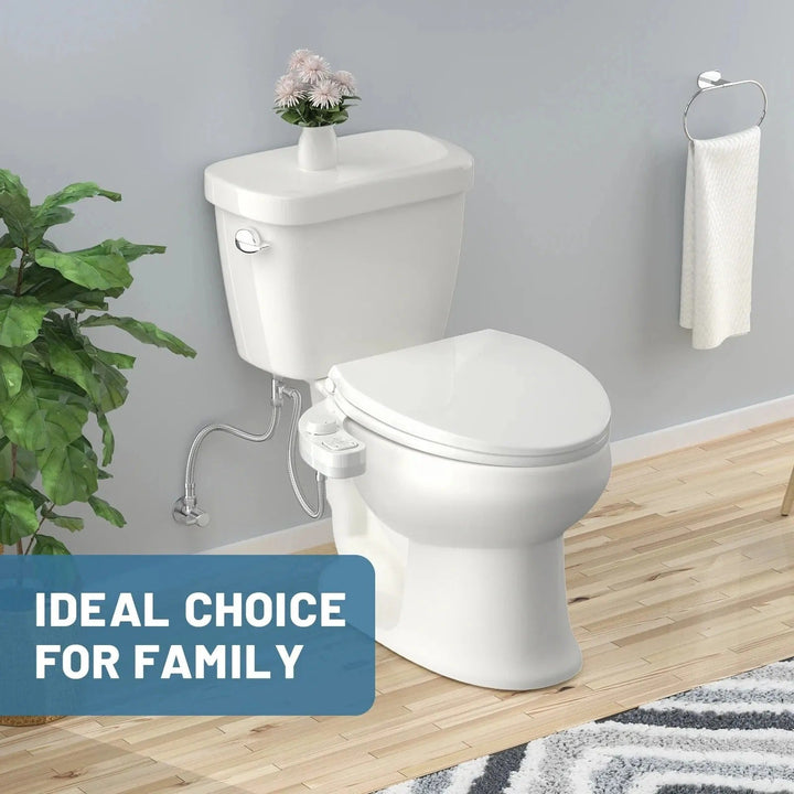 Toalettbidet tillägg monterat på standardtoalett i ljust badrum