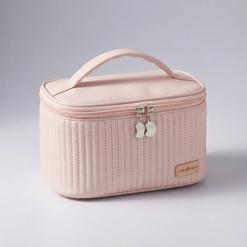 Grön kompakt necessär (NeatCase) med dragkedja, utmärkt för att hålla toalettartiklar organiserade.