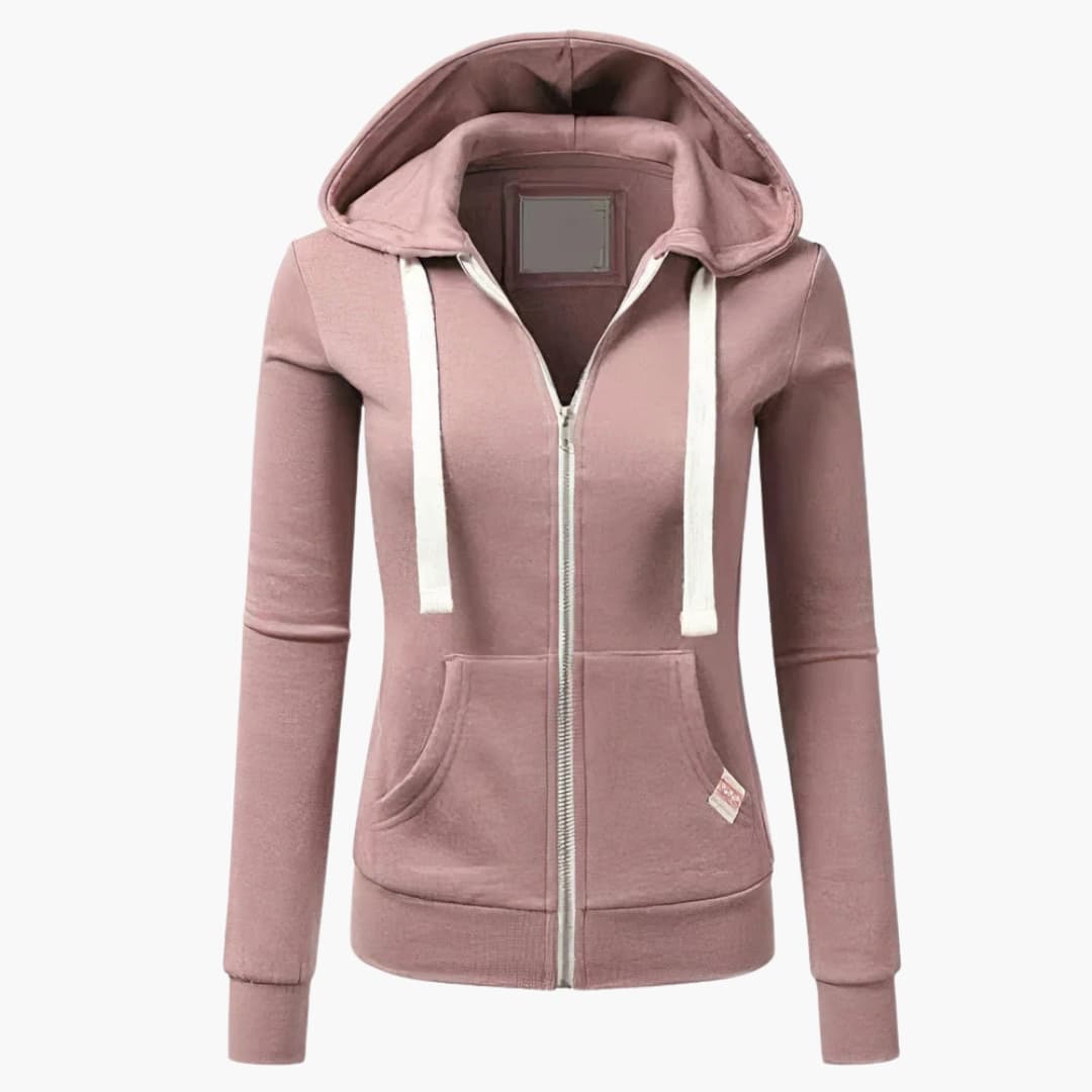Rosa dam hoodie med zip, tillverkad i mjukt tyg. Denna stilrena och sköna huvtröja är en vardagsfavorit för damkläder.