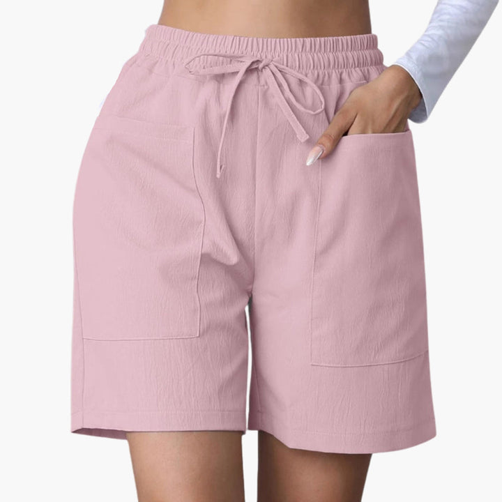 Luftiga sommarbyxor med vida ben och elastisk midja, idealiska för kvinnor som söker komfort.