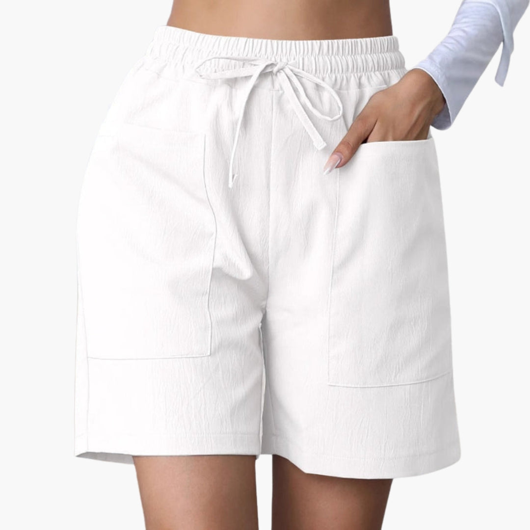 Lättanvända pull-on dambyxor med elastisk midja och vida ben, bekväma för alla kvinnor.