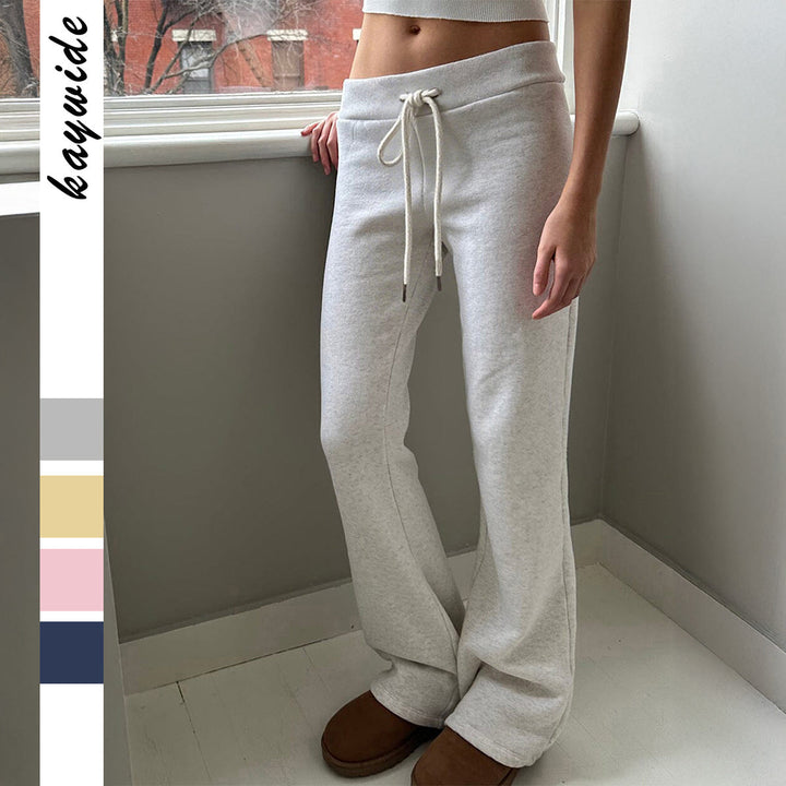 Bekväma figurnära dam joggingbyxor med elastisk midja för fritid. Mjuka vardagsbyxor med perfekt passform.