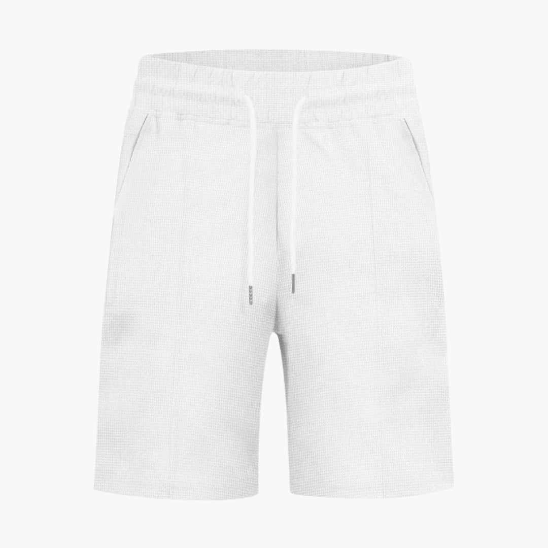 Ljusgrå bekväma sportshorts för herrar, med elastisk midja, dragsko och sidofickor.