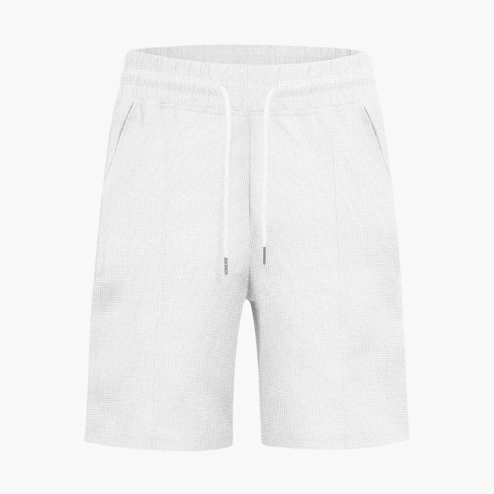 Ljusgrå bekväma sportshorts för herrar, med elastisk midja, dragsko och sidofickor.