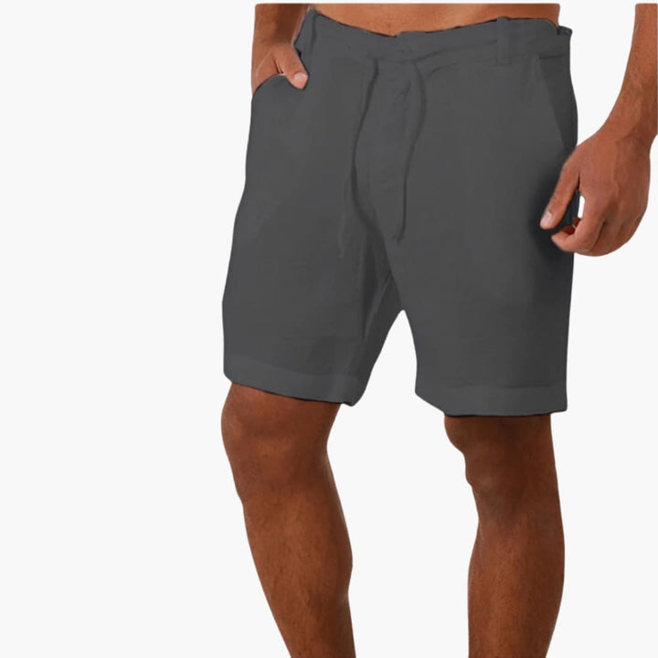 Avslappnade herrshorts med dragsko för sommar och fritid. Moderna och bekväma, perfekt herrkläder.