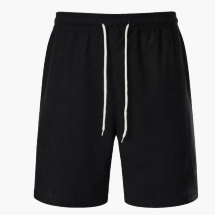 Casual enfärgade herrshorts med ribbad struktur & dragsko, idealiska för fritid & sommar.