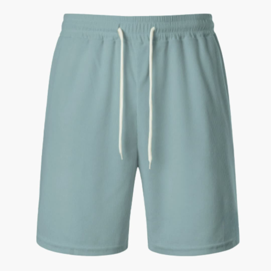 Herrshorts med mjuk ribbad textur & justerbar dragsko, bekväma för sommarens alla äventyr.