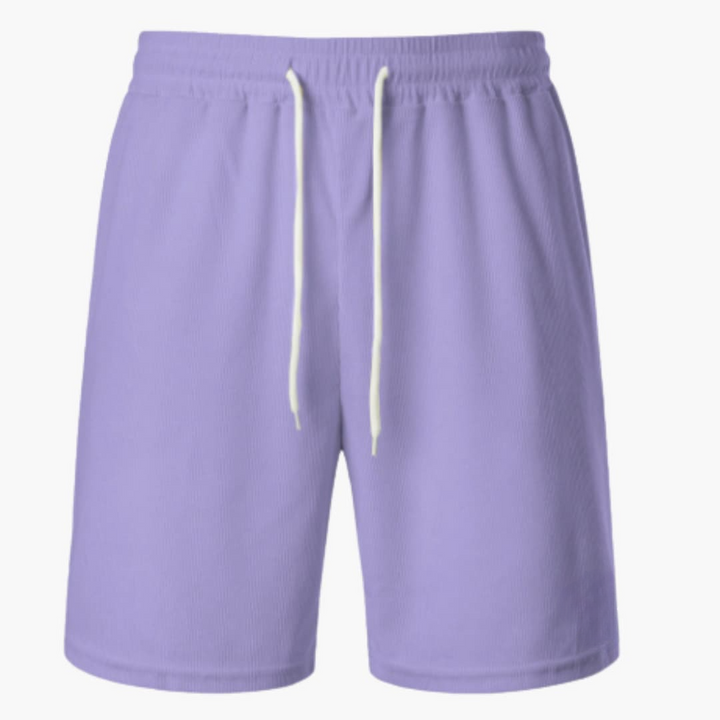 Herrshorts för sommarbruk, med smart ribbad textur & dragsko för en casual look med fickor.