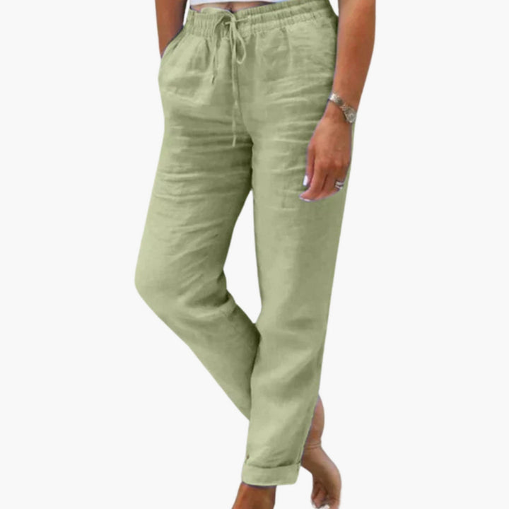 Bekväma sommarbyxor för dam med dragsko och lös passform, perfekta för casual stil och semester.