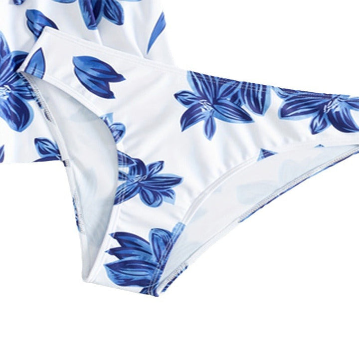 Somrigt blommigt tankini-set för damer. Komplett badmode med topp och högskurna trosor, perfekt för semester.