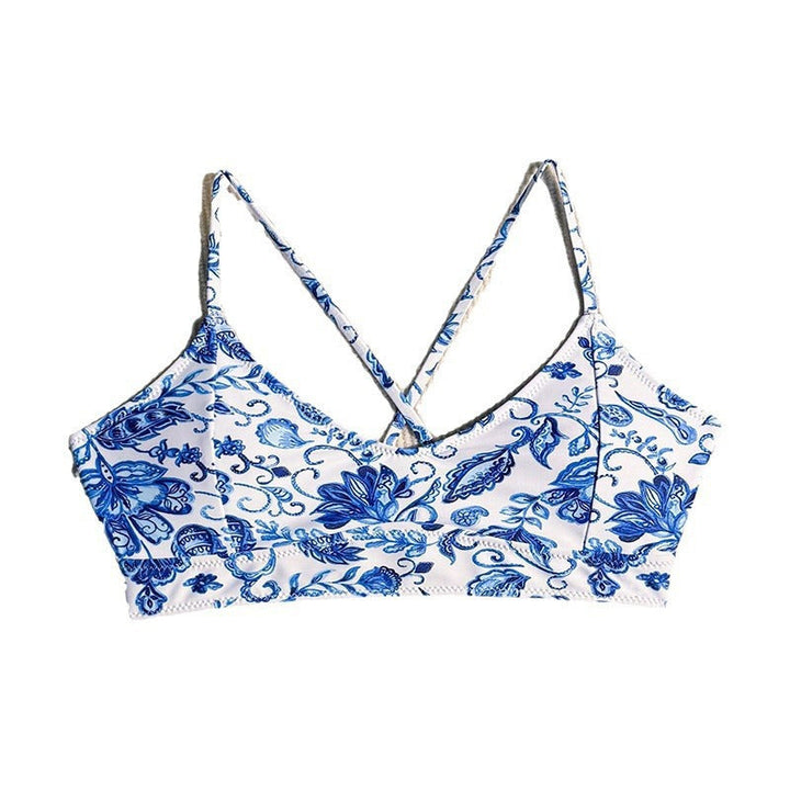 Justerbar blå triangel bikini topp för damer. Trendigt blommönster, perfekt för sommarens strandmode.