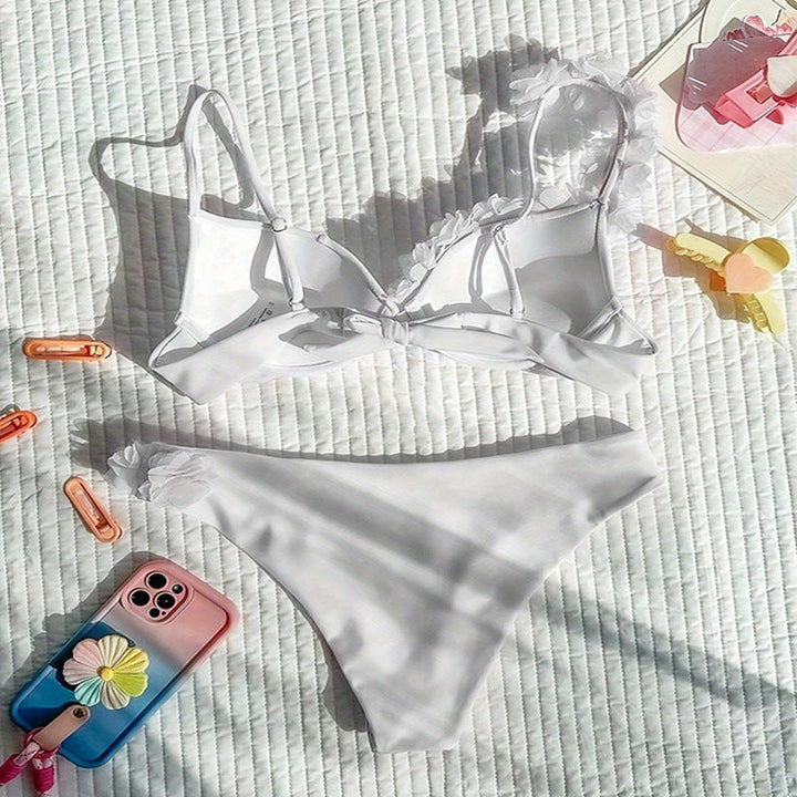 Justerbar triangelbikini för dam i blommigt mönster. Snabbtorkande strandmode med UV-skydd för sommaren.