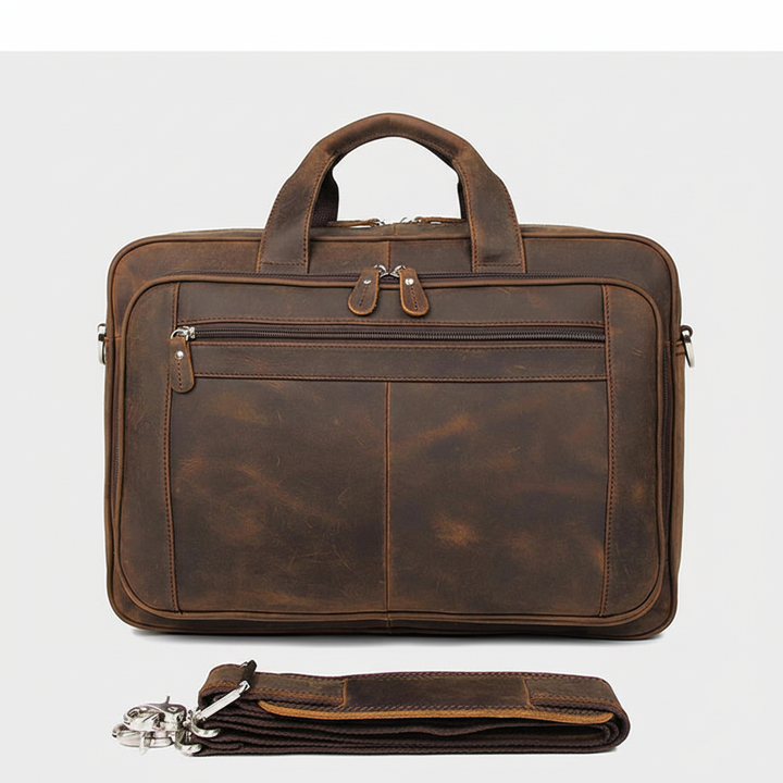 Elegant axelremsväska i vintage läderstil. Rymlig portfölj för professionellt bruk, perfekt för arbete och resor.