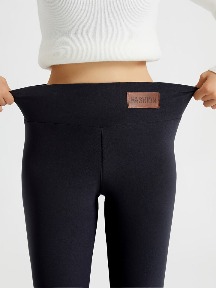 Högmidjade leggings för dam som värmer under kalla dagar