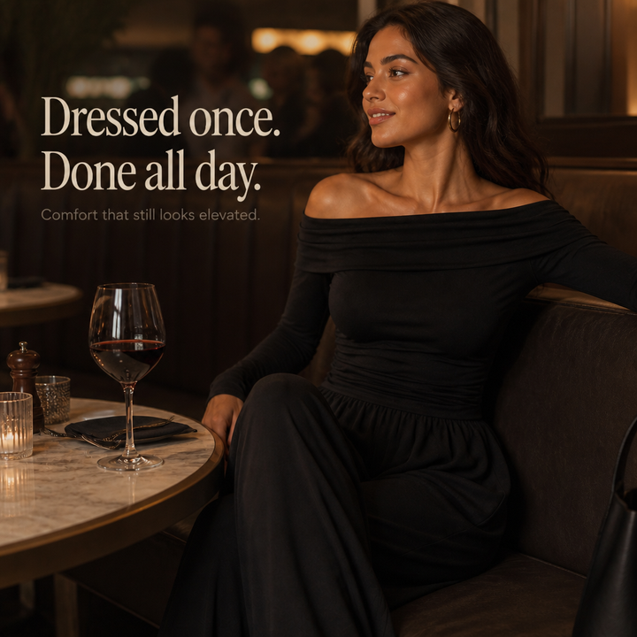 Snygg damjumpsuit med bar axel som visar midjans passform