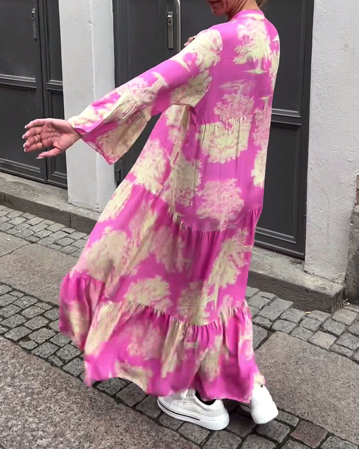 Losgående maxiklänning med V-ringning och trumpetärm
