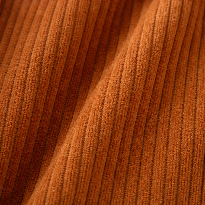 Elegant orange vardagstopp för dam med draperad passform