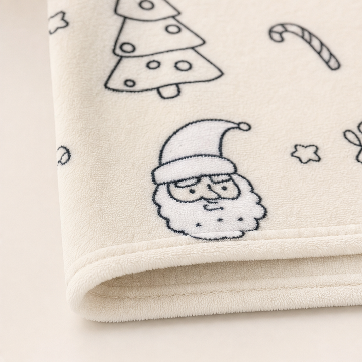 Kreativ pysselfilt med tryckta julmotiv för barnens egna färger