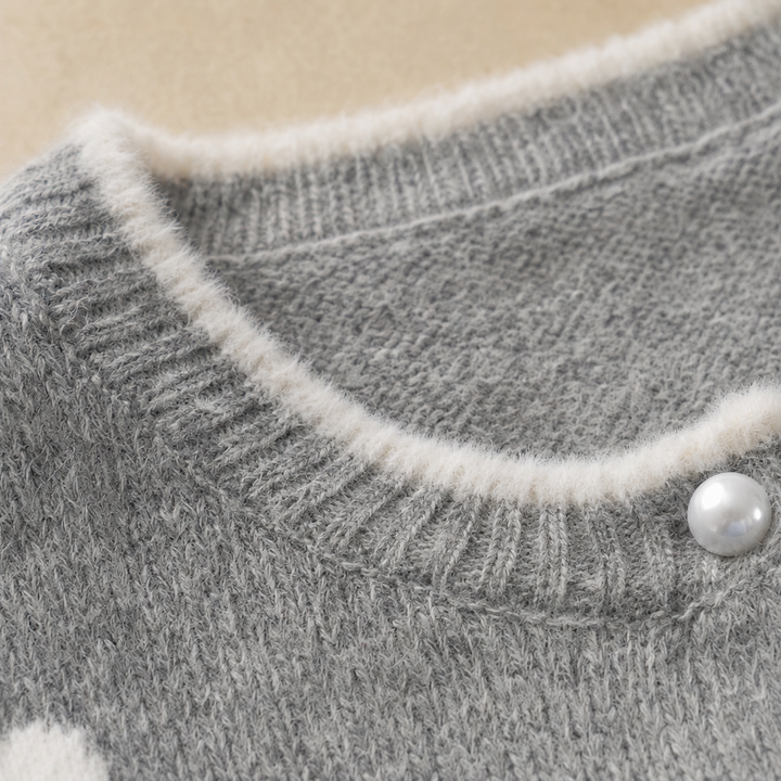 Vardaglig cropped damkofta med blommiga designdetaljer